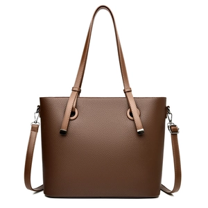 Classic dark brown pebble leather tote bag with dual handles and crossbody strap