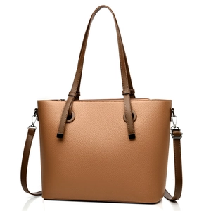 Brown lychee pattern leather tote bag with silver hardware and adjustable strap