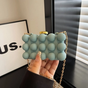 Light blue bubble texture acrylic box bag with gold chain and metal clasp