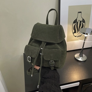 Retro dark green matte suede mini backpack with dual front pockets and silver buckle