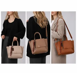 Tres formas de llevar el bolso tote: de mano, bandolera y al hombro con estilo
