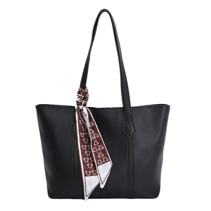 Minimalist black PU leather tote bag with stylish patterned silk scarf on handle