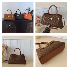 Detailed view of woven texture tote bags with golden X-shaped metal buckles and leather straps
