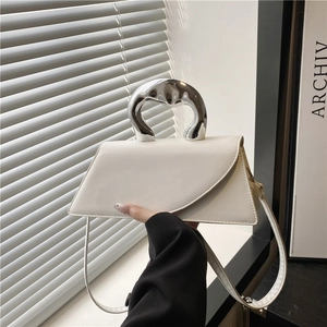 Minimalist white trapezoidal crossbody bag with high-shine fluid silver metal handle