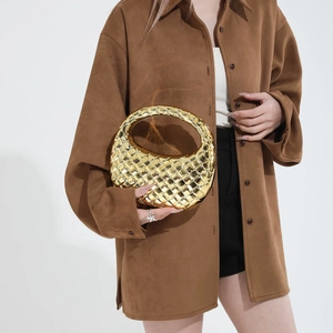 Chic gold woven hobo handbag featuring an intricate Intrecciato pattern and crescent shape