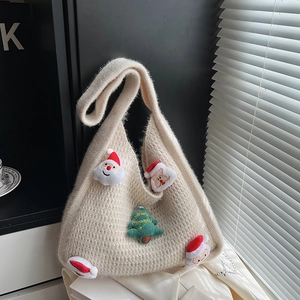 Large Christmas knit tote bag with 3D Santa and tree on white minimalist background