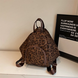 Sac à dos tendance imprimé léopard pour femme avec poche dorée et sangles tissées