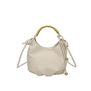Elegant cream white half-moon shoulder bag with gold metal handle and stylish knotted straps