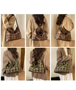 Detail view of retro plaid tote bags with leather base and drawstring bow in two colors