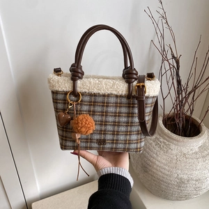 Plaid wool tote bag with white fleece trim and brown heart charm for autumn winter