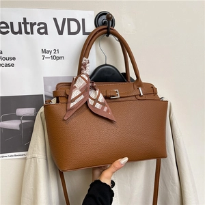 Brown litchi grain leather tote bag with printed silk scarf and crossbody strap
