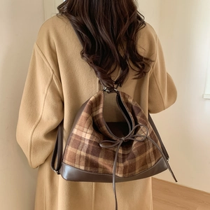 Brown vintage plaid tote bag in wool fabric with leather straps and drawstring bow detail