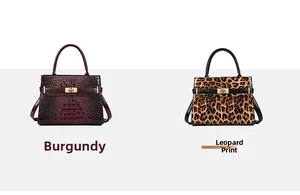 Details von weinroten Krokodil- und Leoparden-Handtaschen mit goldenen Drehverschlüssen