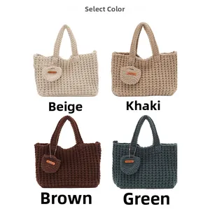 Detail view of four handmade knitted tote bags in beige khaki coffee and green