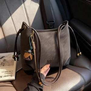 Retro dark coffee nubuck underarm bag with thin straps and leather flower charm