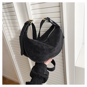 Vintage black leather hobo bag with adjustable strap and matte finish for women