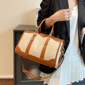 Retro canvas Boston bag with brown leather trim and adjustable strap for women