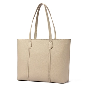 Sac cabas élégant en cuir beige avec texture grainée pour le bureau et le quotidien