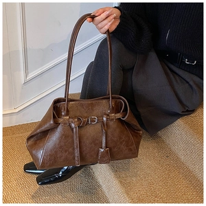Retro deep brown oil-wax leather shoulder bag with vintage metal buckle detail