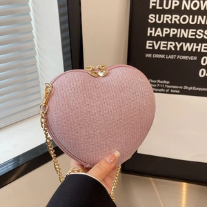 Chic pink heart-shaped glitter evening bag with gold chain strap for women