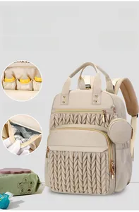 Detail of insulated aluminum foil pocket and bottle compartments in quilted backpack