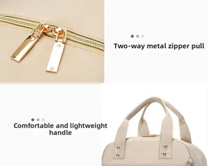 Detail of cream backpack with gold two-way metal zippers and reinforced top handles
