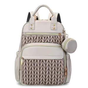 Beige quilted large capacity backpack for women with matching mini round pouch accessory
