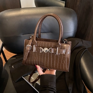 Dark brown crocodile embossed Kelly bag with silver hardware and top handles