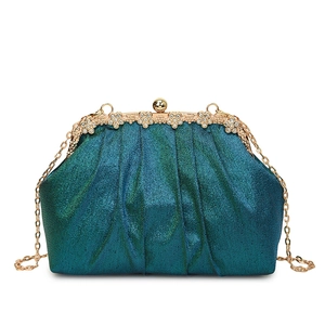 Elegant teal glitter evening bag with gold chain strap and floral rhinestone clasp for parties