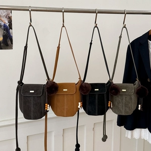 Women Retro Suede Look PU Bucket Crossbody Bag Minimalist Contrast Stitching Shoulder Bag With Pom Pom Charm And Metal Decor