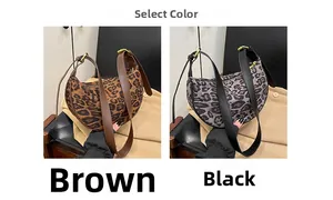 Detail view of leopard print crescent bags in brown and grey with leather straps