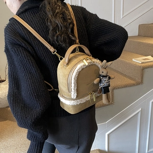 Chic suede backpack with faux fur trim and cute rabbit pendant for women