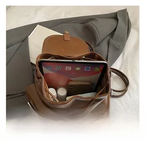 Top view of the interior compartment showing large capacity for tablet and phone