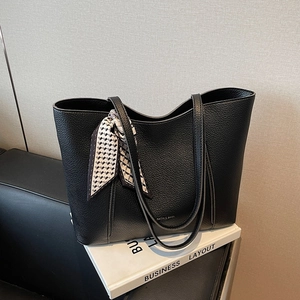 Classic black litchi pattern leather tote bag with elegant geometric print silk scarf
