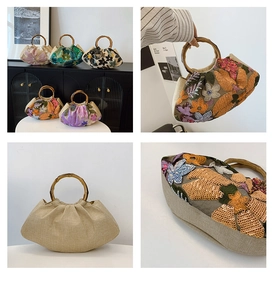Macro detail of intricate floral sequin embroidery and bamboo handle on the retro handbag