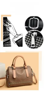 Detail of vintage brown woven pillow bag with silver hardware and lobster clasp