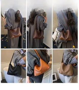 Détails du grand sac Hobo en cuir grainé avec texture litchi et bandoulière réglable