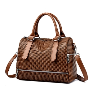 Brown woven texture boston handbag with adjustable leather straps and silver zippers