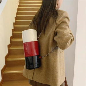 Chic tricolor cylinder shoulder bag with white red black leather and metal chain