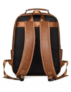 Brown leather backpack back view showing breathable mesh padding and luggage strap