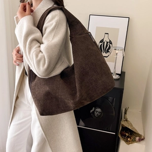 Large dark brown hobo shoulder bag in textured corduroy fabric for casual daily fashion