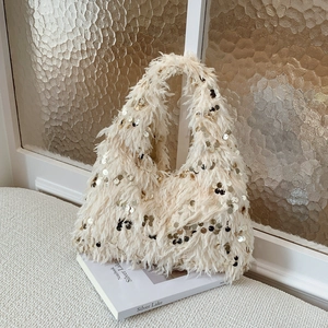 Furry cream handbag with sparkling gold sequins and chain strap for evening events