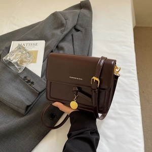Minimalist dark brown square crossbody bag with Fashion & Bag print on glossy leather
