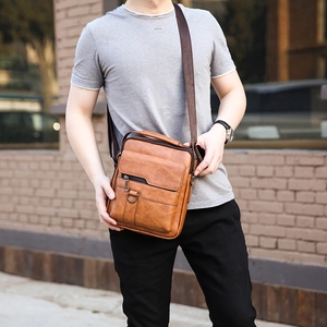 Men's brown PU leather crossbody bag with multiple zippers and adjustable shoulder strap