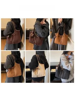 Multiple views of women's tote bag with bow detail and slim shoulder straps