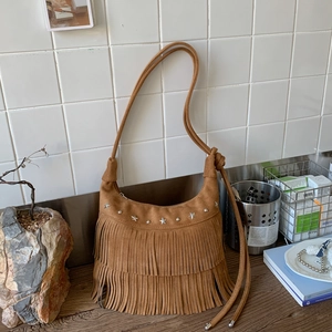 Vintage brown suede underarm bag with double tassels and silver star rivets decoration