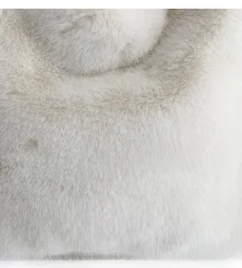 Macro shot of fluffy faux fur texture for a soft minimalist large shoulder bag