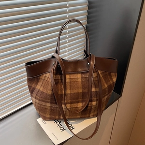 Retro plaid tote bag in brown wool fabric with leather handles and metallic rivet details