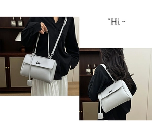 Detailed view of light grey bucket bag showing front and back with metal turn-lock closure