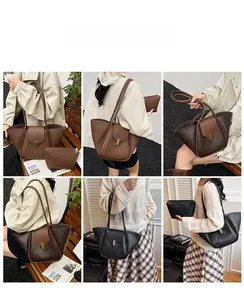 Detail view of woven leather tote bag and clutch set in brown and black colors
